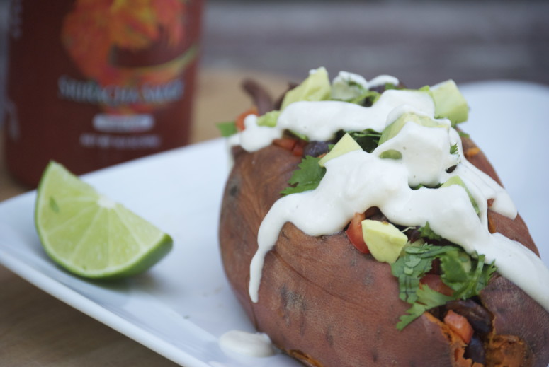 Baked Stuffed Sweet Potatoes with Black Beans & Lime Crema