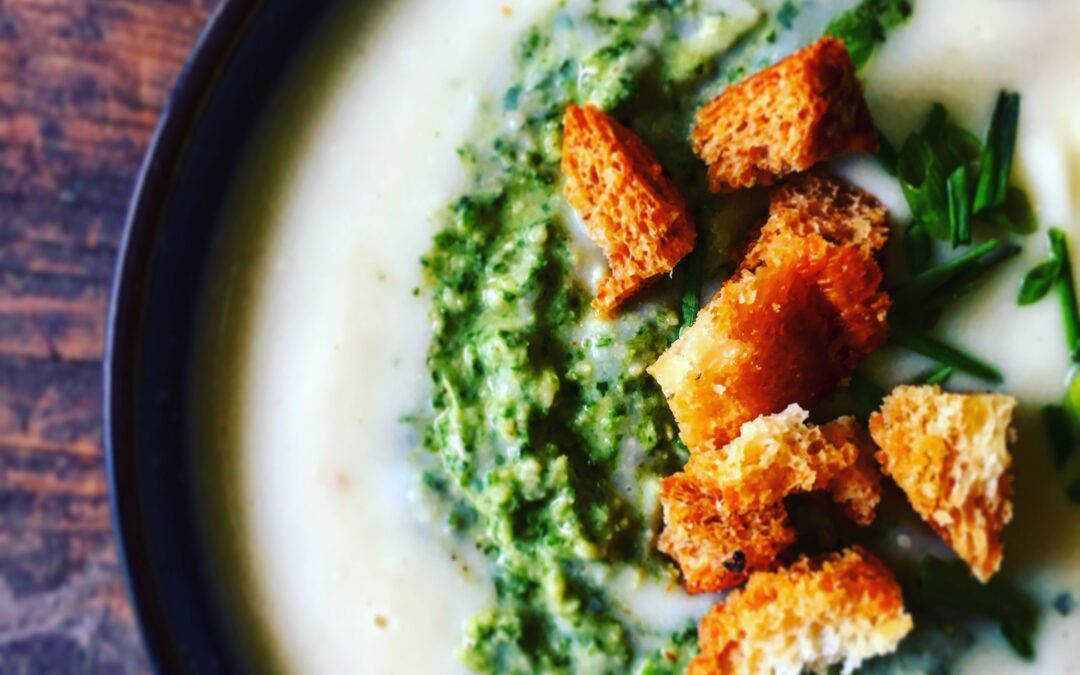 Cheesy Cauliflower Soup with Kale Pesto