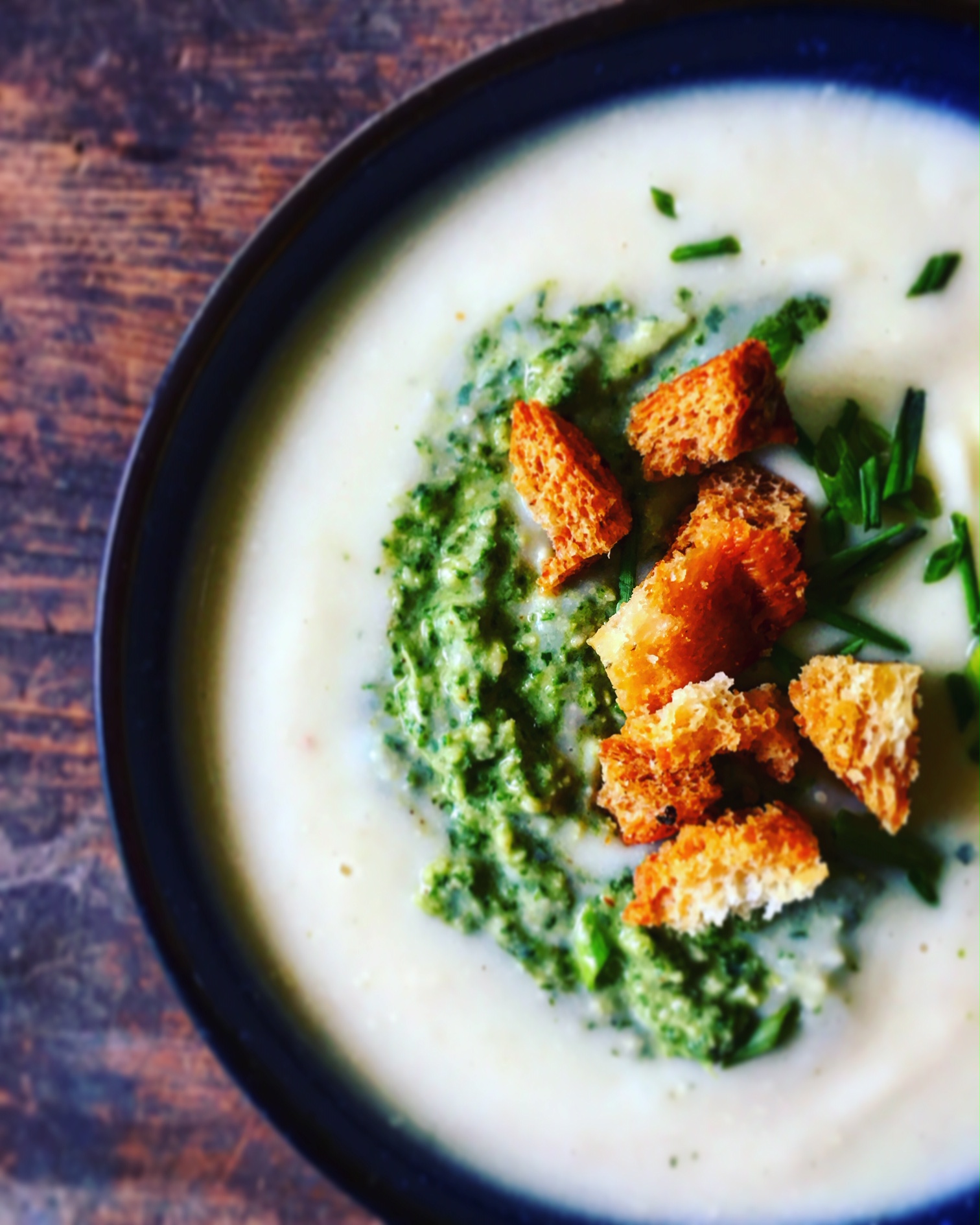 Cheesy Cauliflower Soup with Kale Pesto