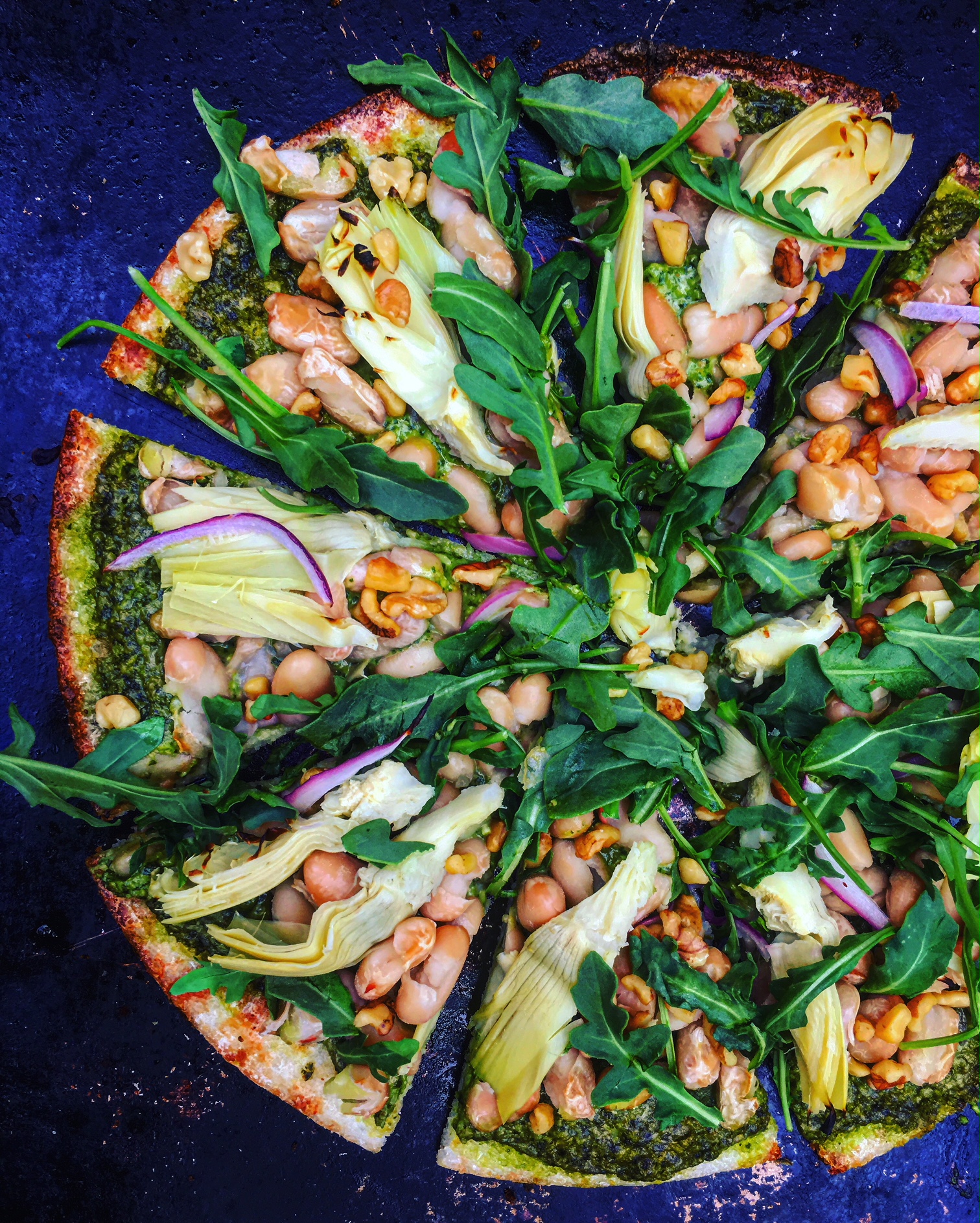 Pesto Pizza with Arugula, Artichokes & White Beans